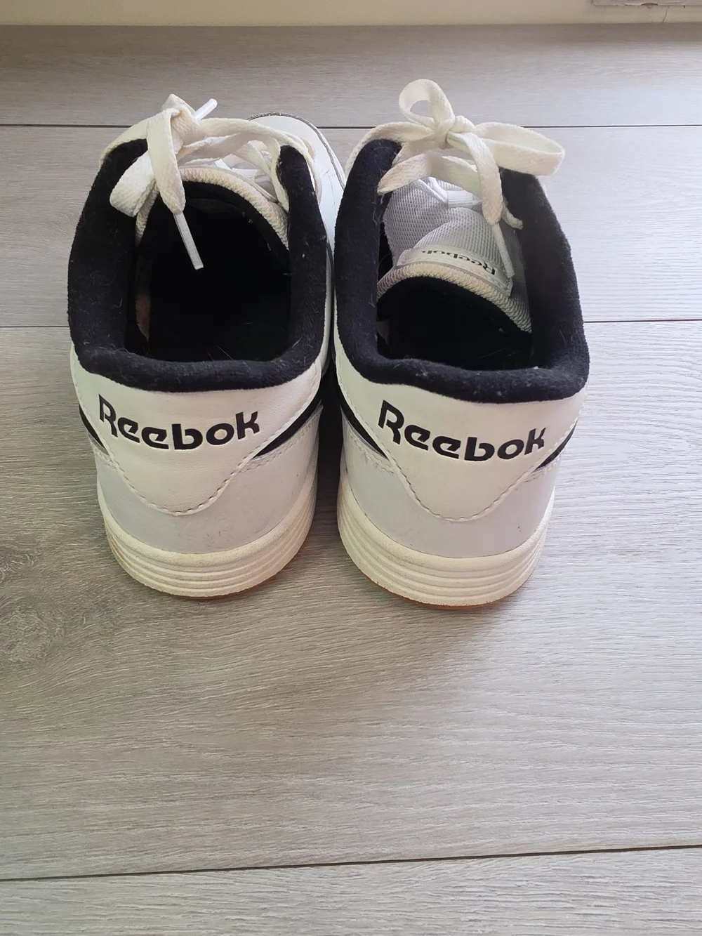 Reebok Womens  Classic White & Black Leather Sneakers